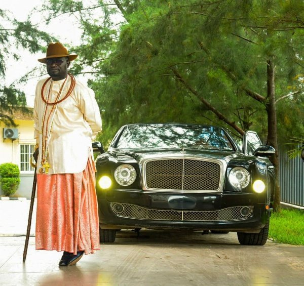 Warri Billionaire Chief Ayiri Emami with Luxury cars, from Rolls-Royce Phantom And Bentley Mulsanne 1 Chief Ayiri Posing In Front Of His Car