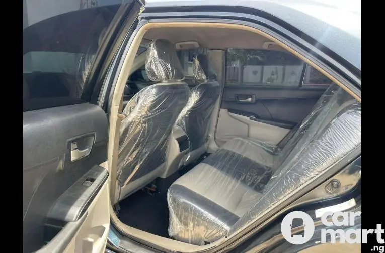 Experts recommend the 2013 Toyota Camry as the best used car to buy 2 Inside view of 2013 Toyota Camry SE