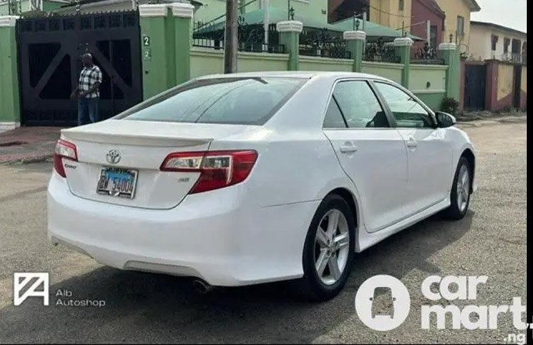 Experts recommend the 2013 Toyota Camry as the best used car to buy 1 back view of 2013 Toyota Camry SE